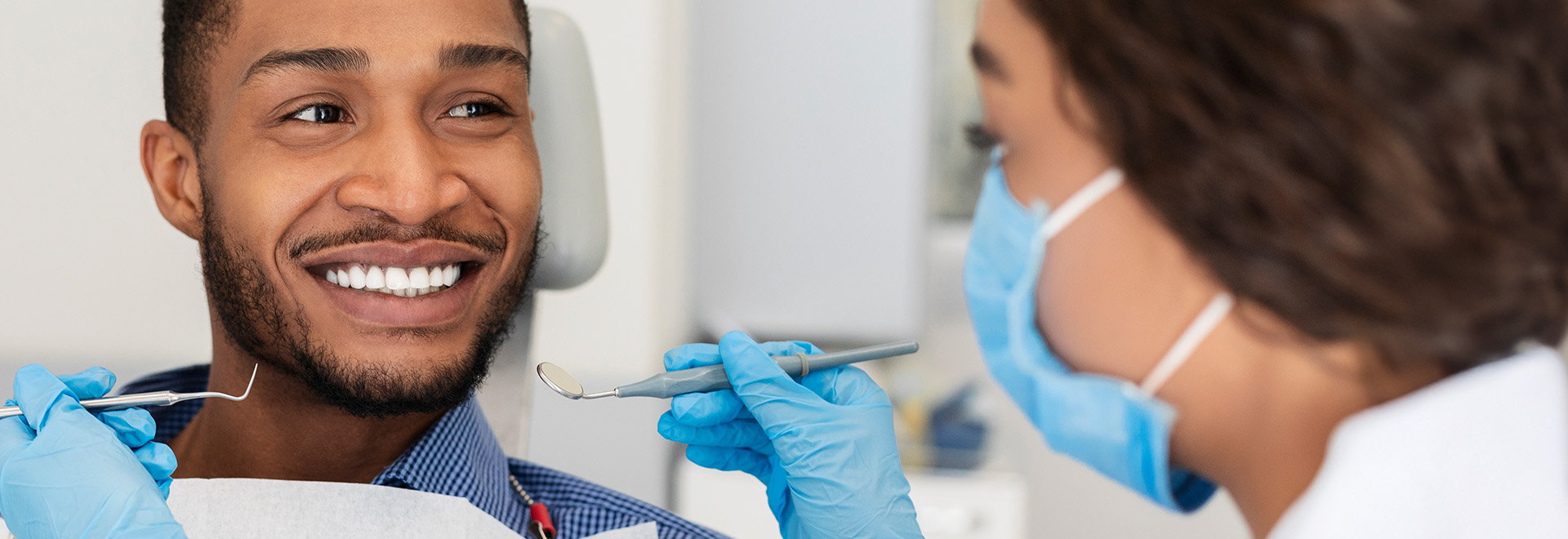 smiling man at dentist