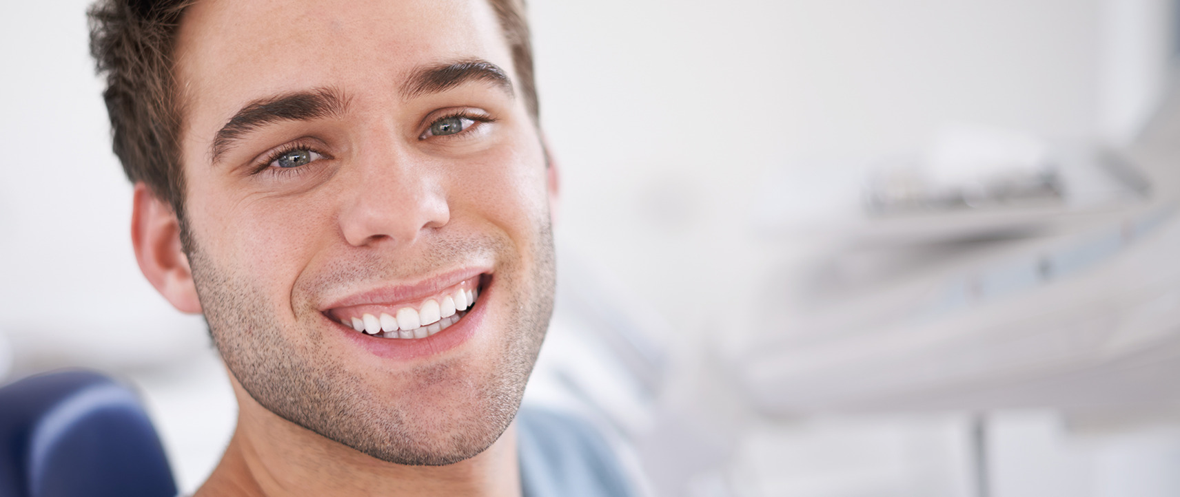 smiling man with straight teeth