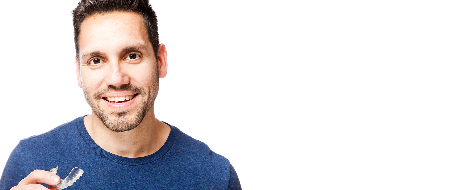 man holding invisalign